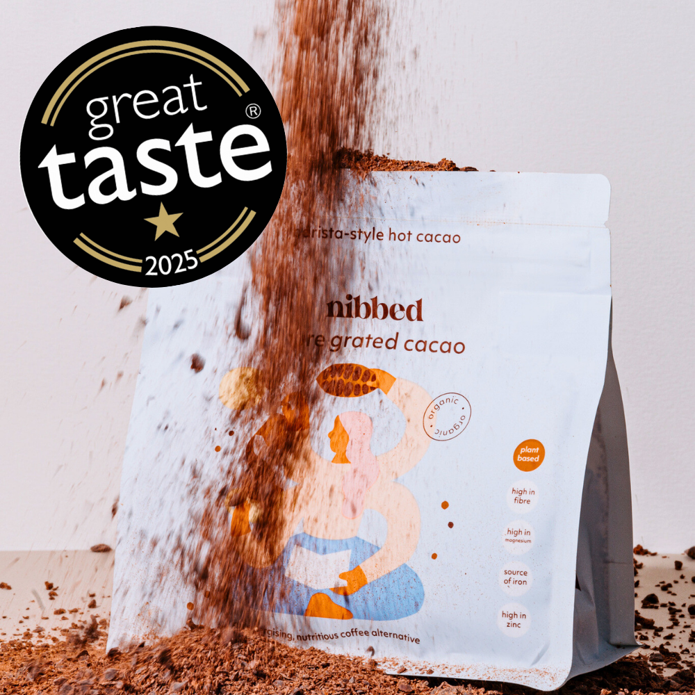 Bag of nibbed re-grated cacao with 'Great Taste' award logo on a light background